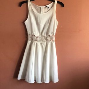 White dress with waist crochet detail